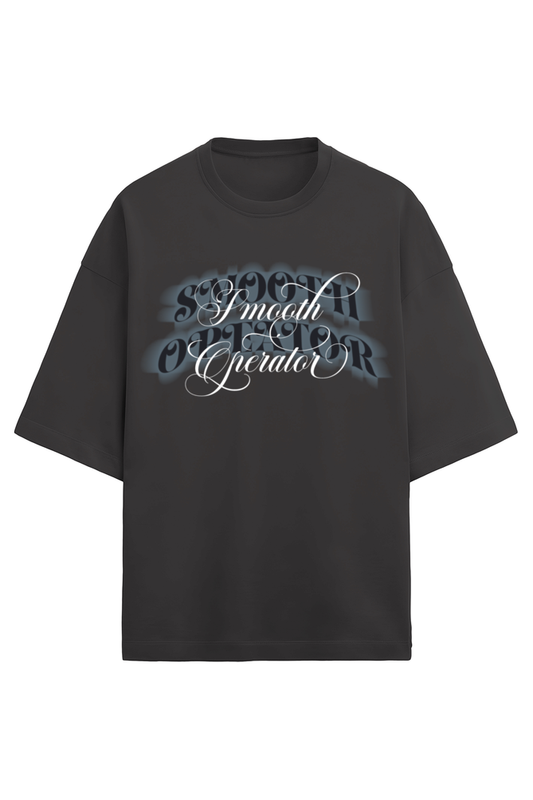 Front view of black oversized t-shirt with Smooth Operator written on it. This premium streetwear design is made out of premium French Terry cotton specially for all Carlos Sainz & Scuderia Ferrari fans. 