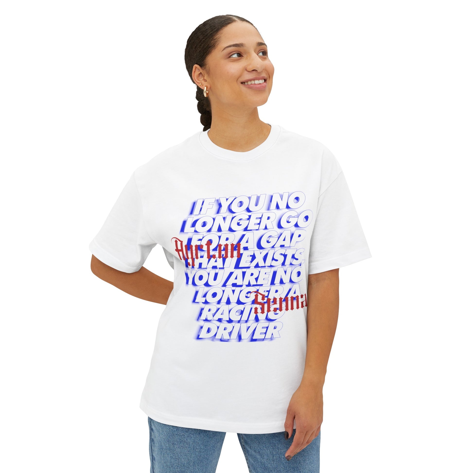 Female model wearing white oversized t-shirt of Ayrton Senna. The t-shirt has Senna's iconic quote 'If you no longer go for a gap that exists, you're no longer a racing driver'. These words are immortalised in the Formula 1 community. Aryton is truly a legend of motorsport. Buy this French Terry cotton t-shirt of Ayrton Senna and celebrate the icon Senna was.